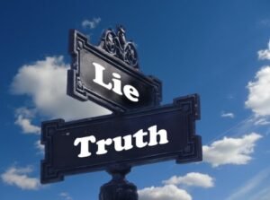 Sharing truthful information by withholding vital details is termed as lying by omission.